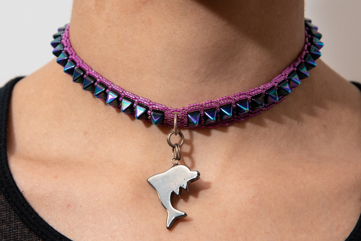 Glass bead necklace with Hematite Dolphin by Daniela Mamon