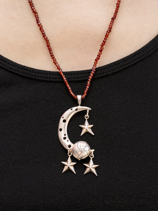 Pied a Terre vintage earth moon and stars pendant on 24" hand strung natural garnet strand